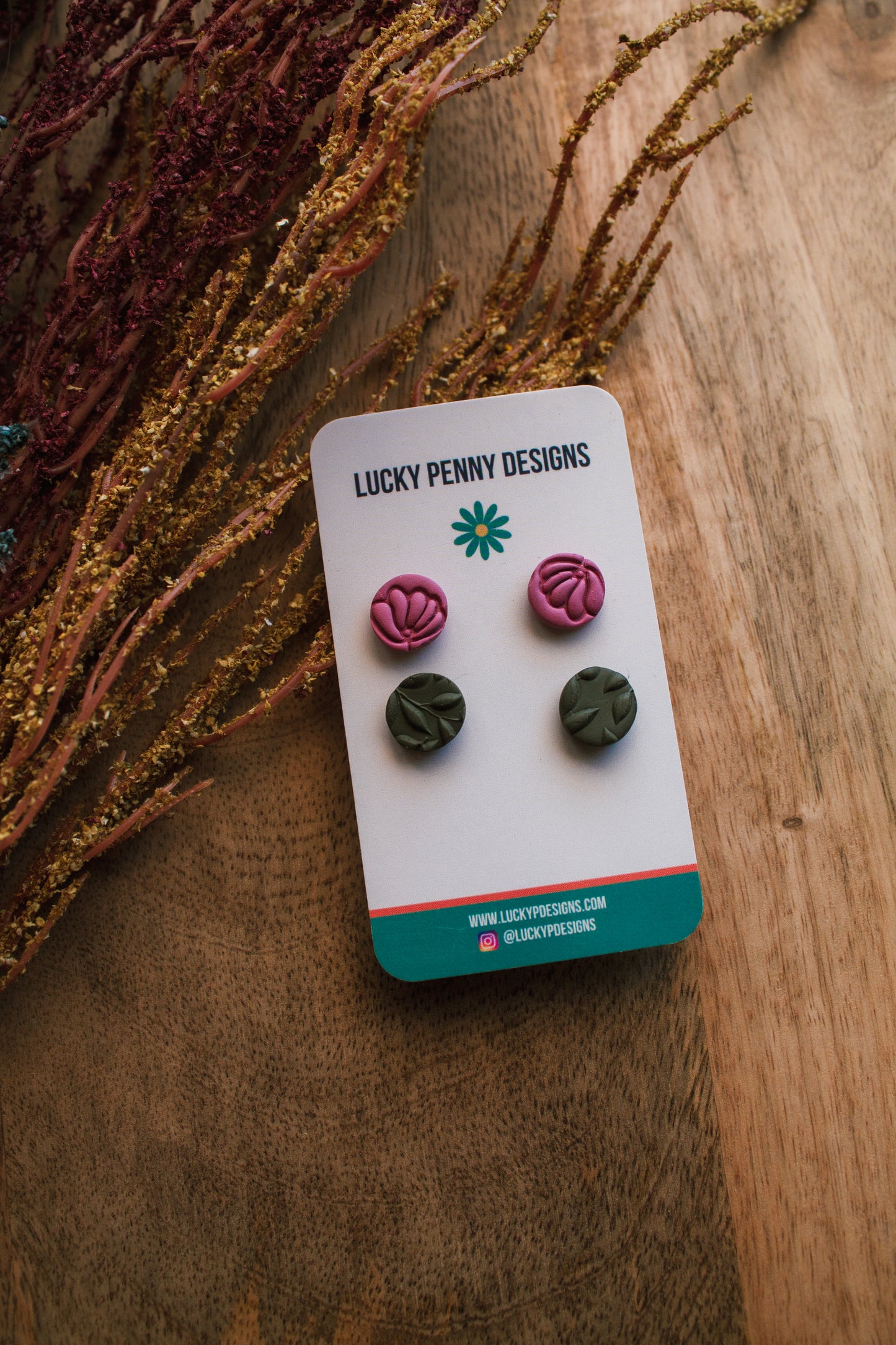 Pink Floral Imprint Studs with Green Studs